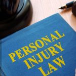 This photo depicts a personal injury definition book being held by a lawyer. The car accident lawyers from Franchi Law can explain personal injury law definitions to Tampa auto accident victims.